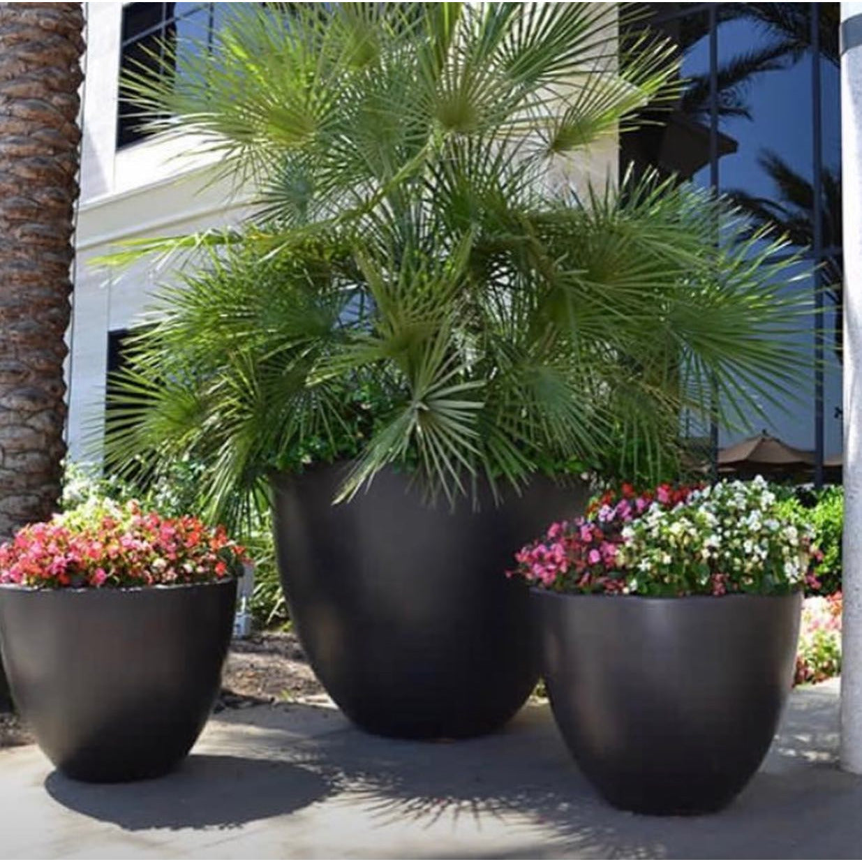 large round black planter pots Legacy Round Planter — Majestic Fountains and More